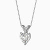 Heart-shaped diamond pendant on a chain against a white background