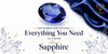 September birthstone sapphire jewelry featuring a blue sapphire gemstone, luxury jewelry design, and elegant silk backdrop.