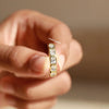 half eternity wedding band and bezel setting.