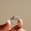 round brilliant cut diamond ring in cathedral style.