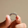 Marquise cut diamond ring in prong setting.