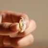 Half eternity weding band in solid gold.