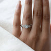 leaf style ring with diamond detail.
