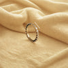 gift for love shown in eternity wedding band.