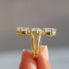 round shaped diamond with prong setting.