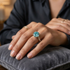 Twisted shank engagement ring double claw prong setting solid gold cyan blue
